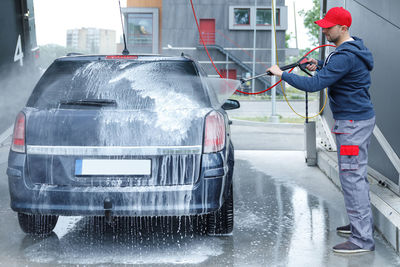 Car wash worker