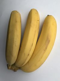 Close-up of bananas against white background