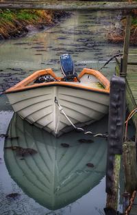 Boats moored in a lake