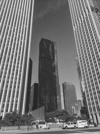 Low angle view of modern buildings against sky in city