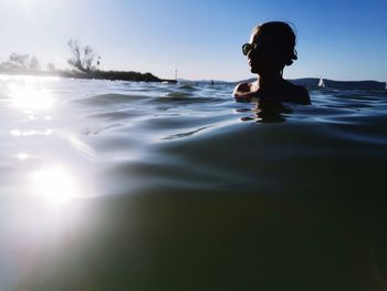 Woman swimming in pool