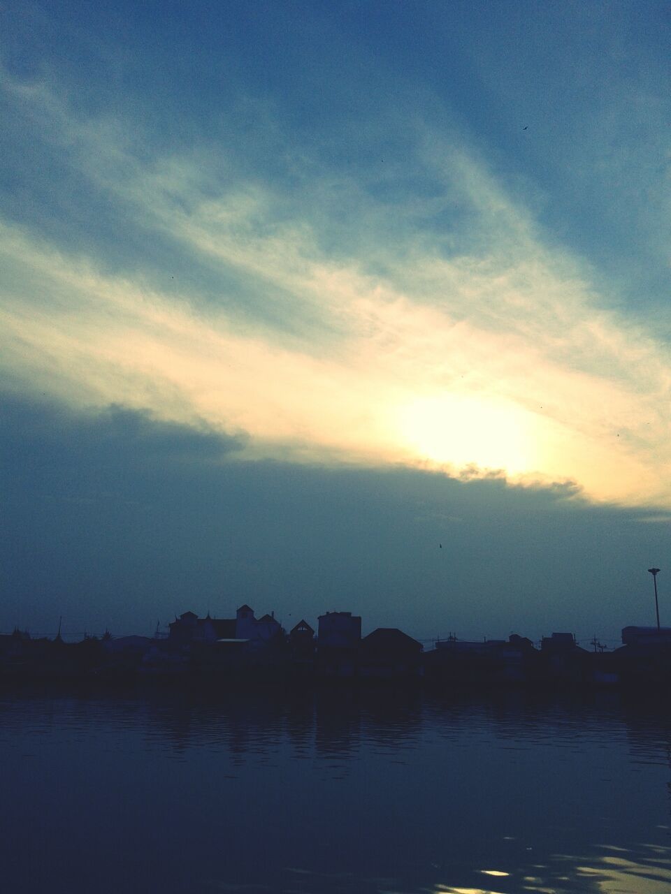 water, sunset, waterfront, sky, reflection, built structure, scenics, building exterior, tranquil scene, tranquility, architecture, cloud - sky, beauty in nature, lake, nature, river, silhouette, sea, idyllic, cloud