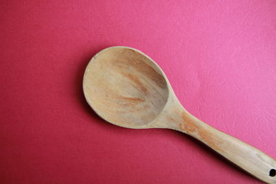 High angle view of bread on pink table