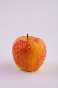 Close-up of apple against white background