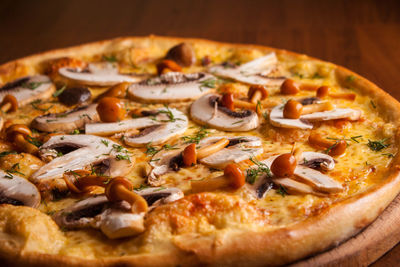 Close-up of pizza served in plate