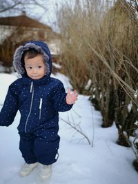 Portrait of cute girl in snow