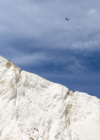 Low angle view of a spitfire aeroplane  flying against sky