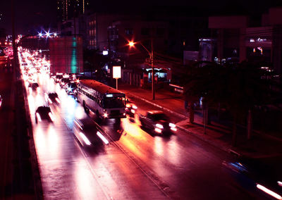 Blurred motion of vehicles on road at night