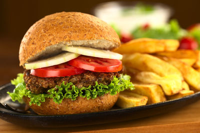 Close-up of burger and vegetables
