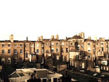 Buildings against clear sky