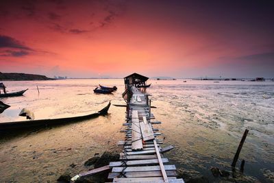 Scenic view of sea against dramatic sky