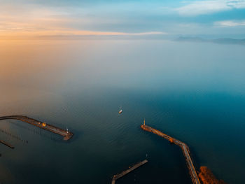 High angle view of sea against sky during sunset