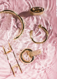 High angle view of wedding rings on table