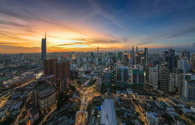 High angle view of cityscape against sky during sunset