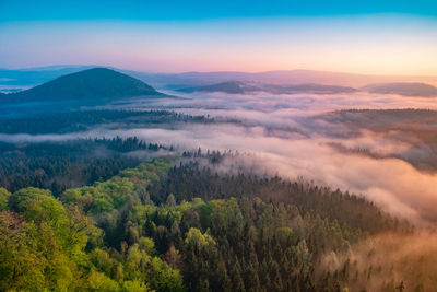 Scenic view of landscape against sky during sunset