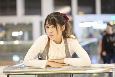 Portrait of a girl sitting on table