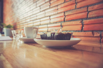 Close-up of coffee cup on table