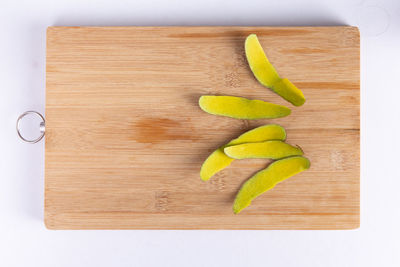 High angle view of chopped leaf on cutting board