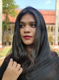 Close-up portrait of a young indian woman