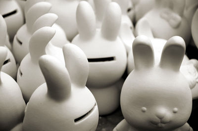 High angle view of piggy banks on table