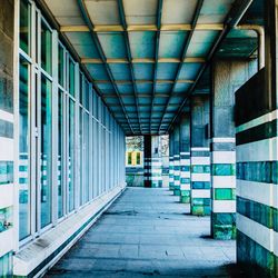 Empty corridor along building