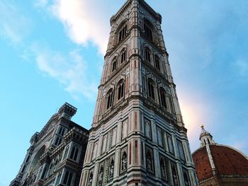 Low angle view of church against blue sky