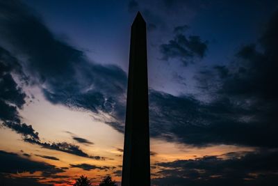 Low angle view of silhouette tree against sky at sunset