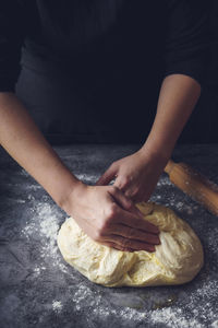 Midsection of woman preparing food