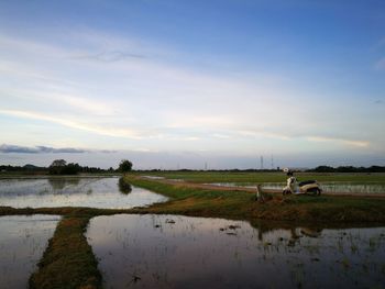 Scenic view of lake against sky