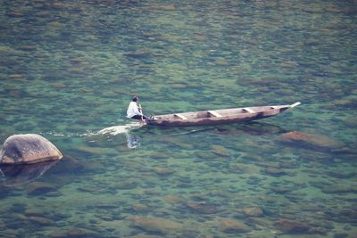 High angle view of ducks swimming in lake