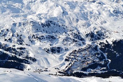 Scenic view of snow covered mountains