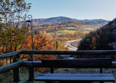 Scenic view of mountains against clear sky during autumn