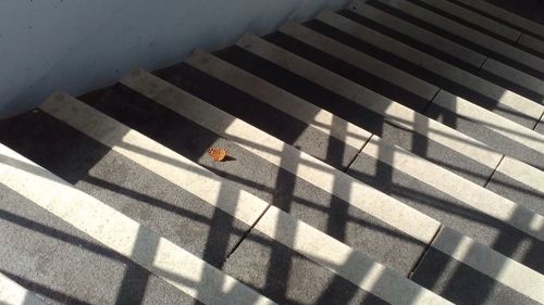 High angle view of shadow on floor