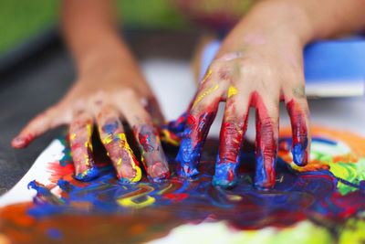 Detail shot of colorful hands