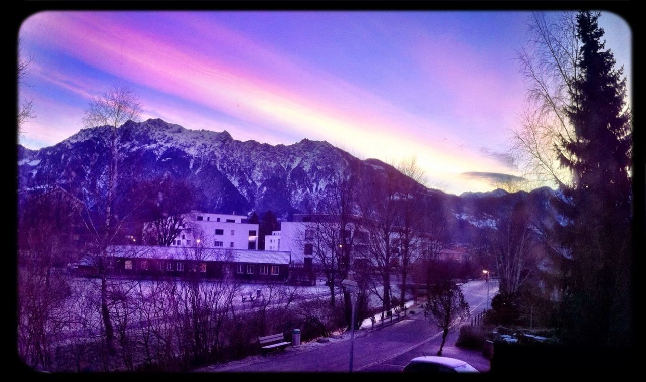 snow, winter, cold temperature, transfer print, building exterior, season, architecture, sky, built structure, mountain, weather, auto post production filter, tree, cloud - sky, house, panoramic, cloud, residential structure, covering, nature