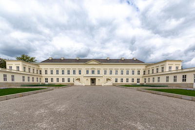 Facade of historic building against sky