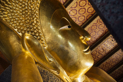 Statue of buddha outside building