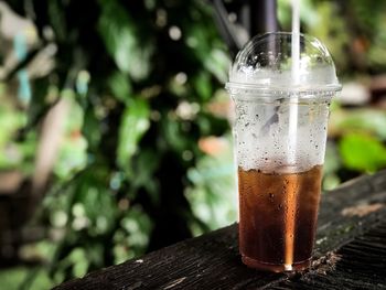 Close-up of drink on table outdoors