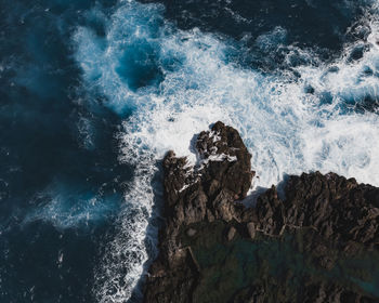 Waves splashing on rocks