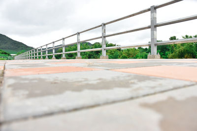 Surface level of bridge against sky