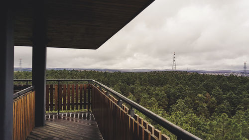 View of observation tower against forest