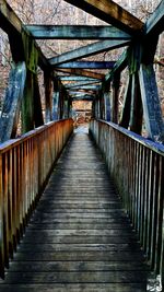 Footbridge amidst wooden bridge