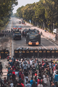 High angle view of people on road in city