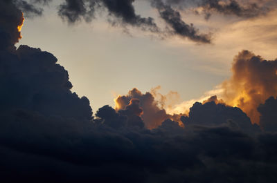 Low angle view of clouds in sky during sunset