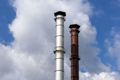 Low angle view of street light against sky