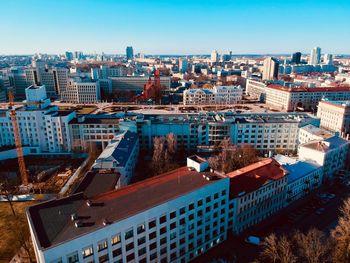 High angle view of buildings in city against sky