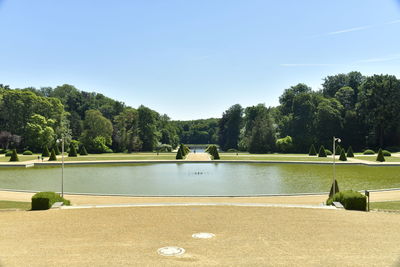 Scenic view of pool against clear sky