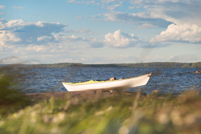 Kayak on the granite shore. no people