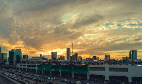 Cityscape against sky during sunset