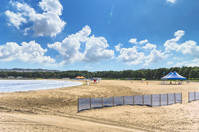 Sand court of beach volleyball divided by a net at uminokoen city park in yokohama.